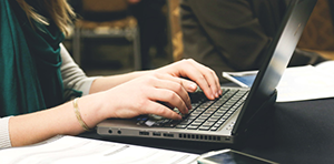 Student using Webchat Software on laptop